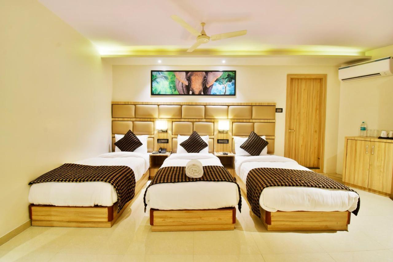 Aura One Hotel Коччи Экстерьер фото
