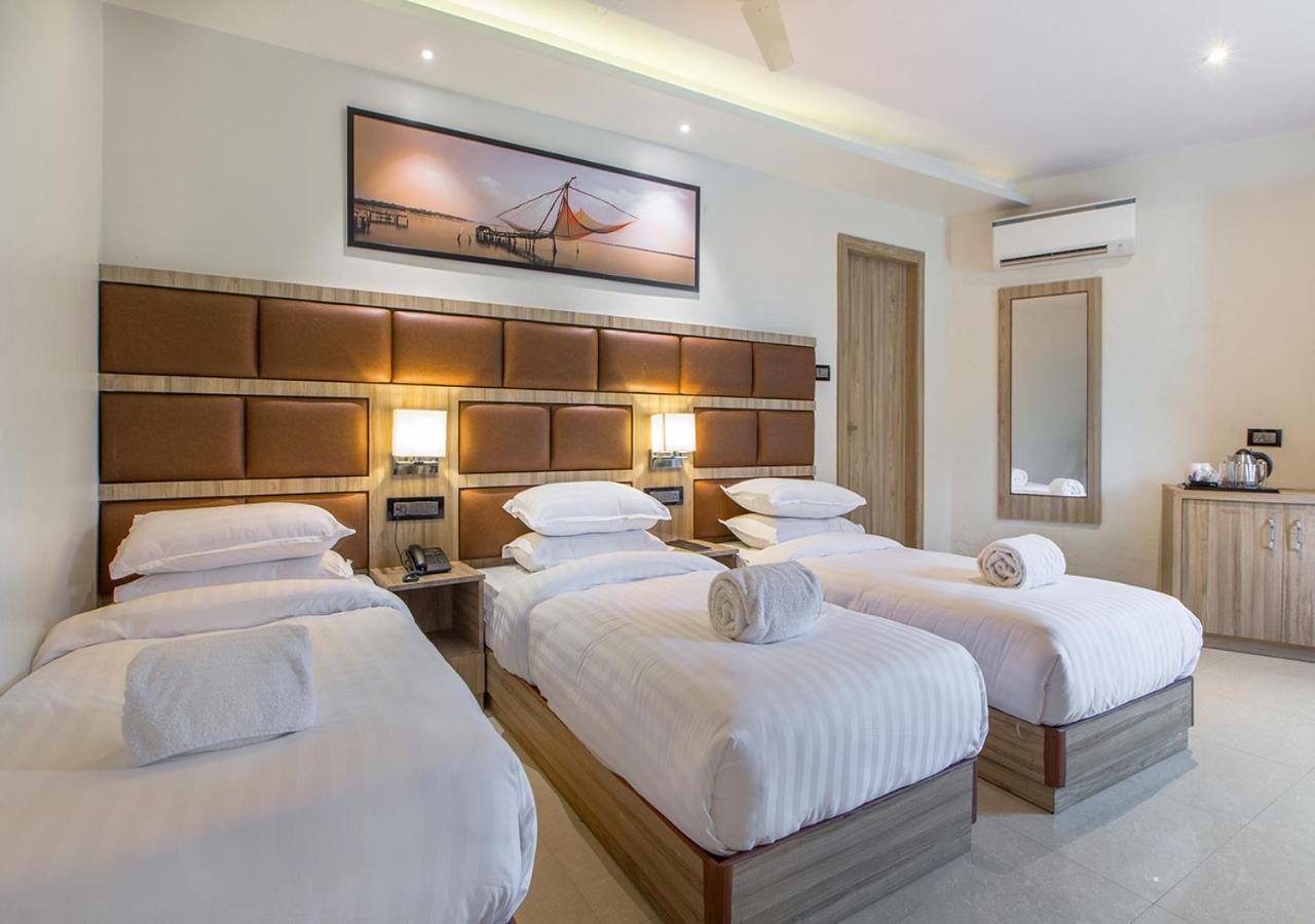 Aura One Hotel Коччи Экстерьер фото